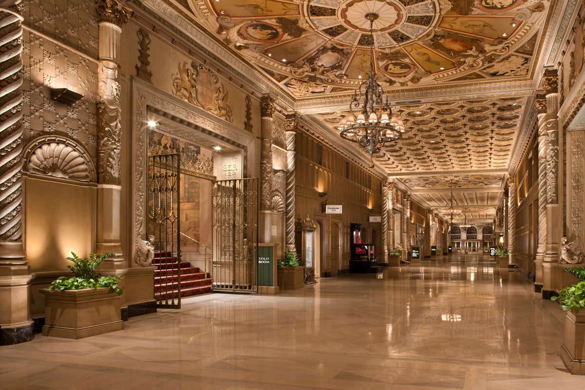 Exterior view of the Millennium Biltmore Hotel in downtown Los Angeles, featuring its historic Beaux-Arts architecture and grand entrance.