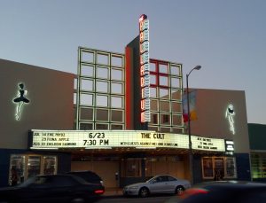Exterior of the Hollywood Palladium in Los Angeles with its classic Art Deco marquee and vertical neon sign.