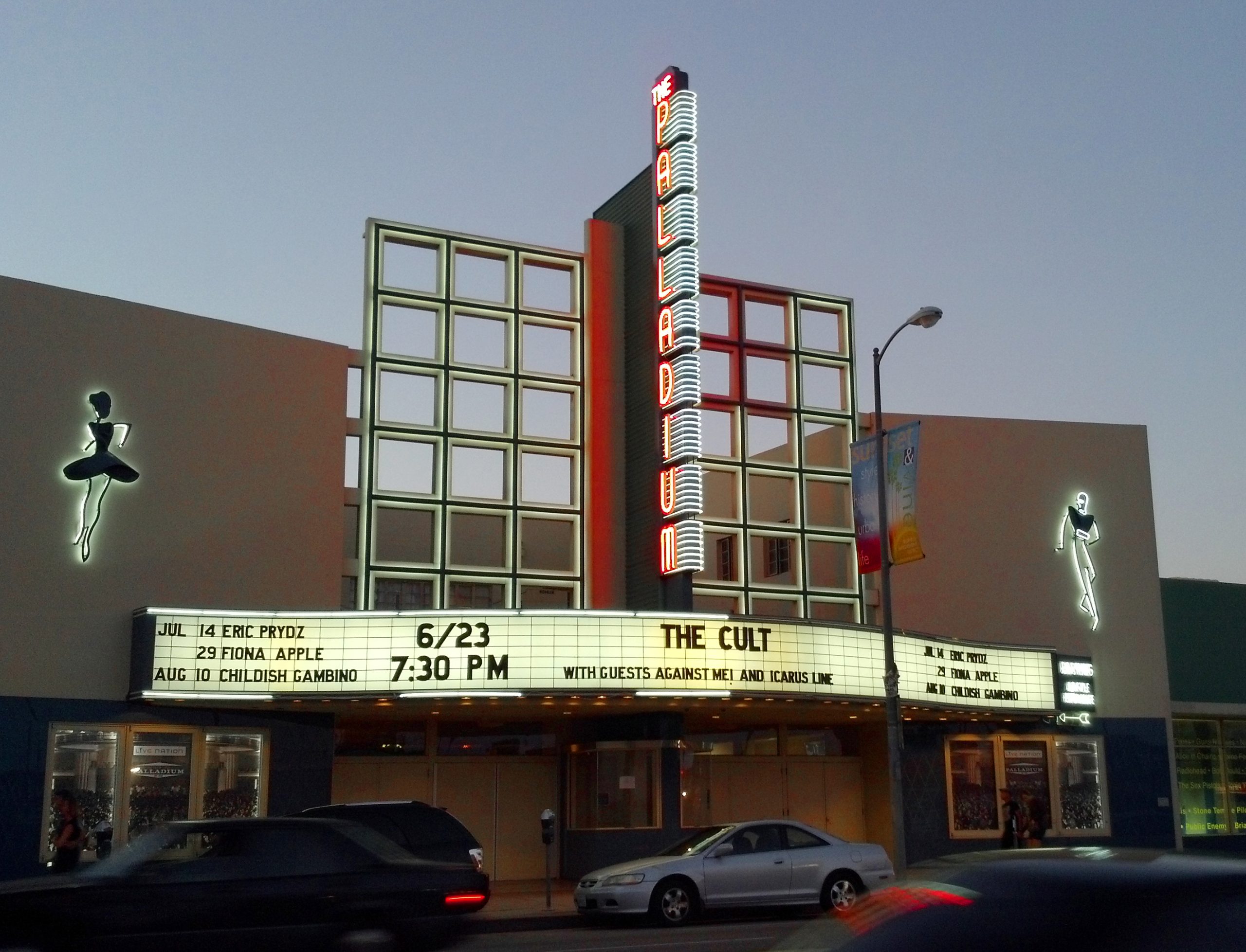 Exterior of the Hollywood Palladium in Los Angeles with its classic Art Deco marquee and vertical neon sign.