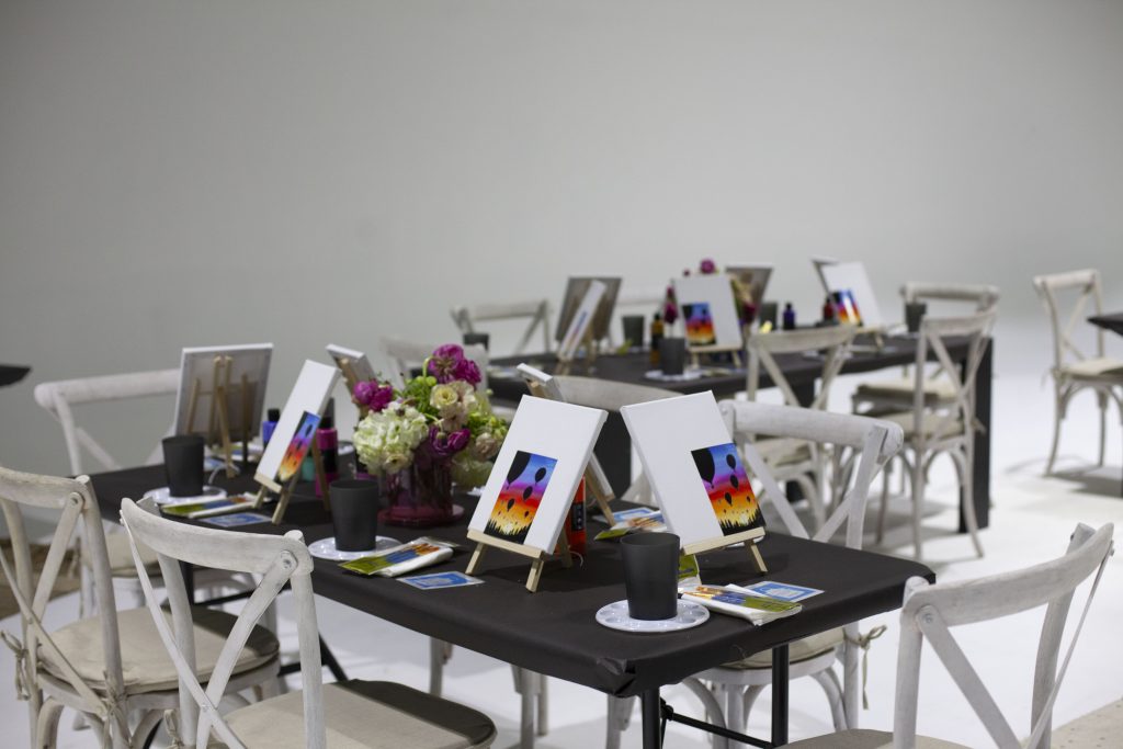best indoor wedding venues in california Indoor paint and sip workshop setup with easels and art supplies.
