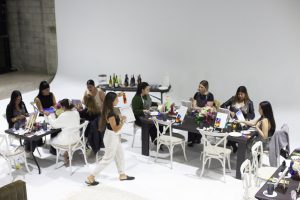 best indoor wedding venues in california Group paint and sip art workshop in an indoor event space.